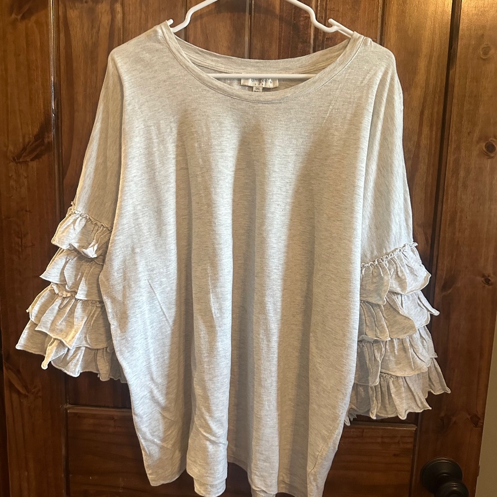 Cotton knit blouse with layered sleeves